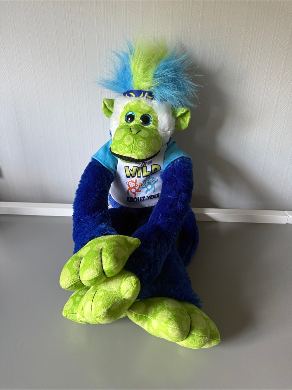 Mohawk Plush Monkey Toy in Blue and Lime Green for neck accessory